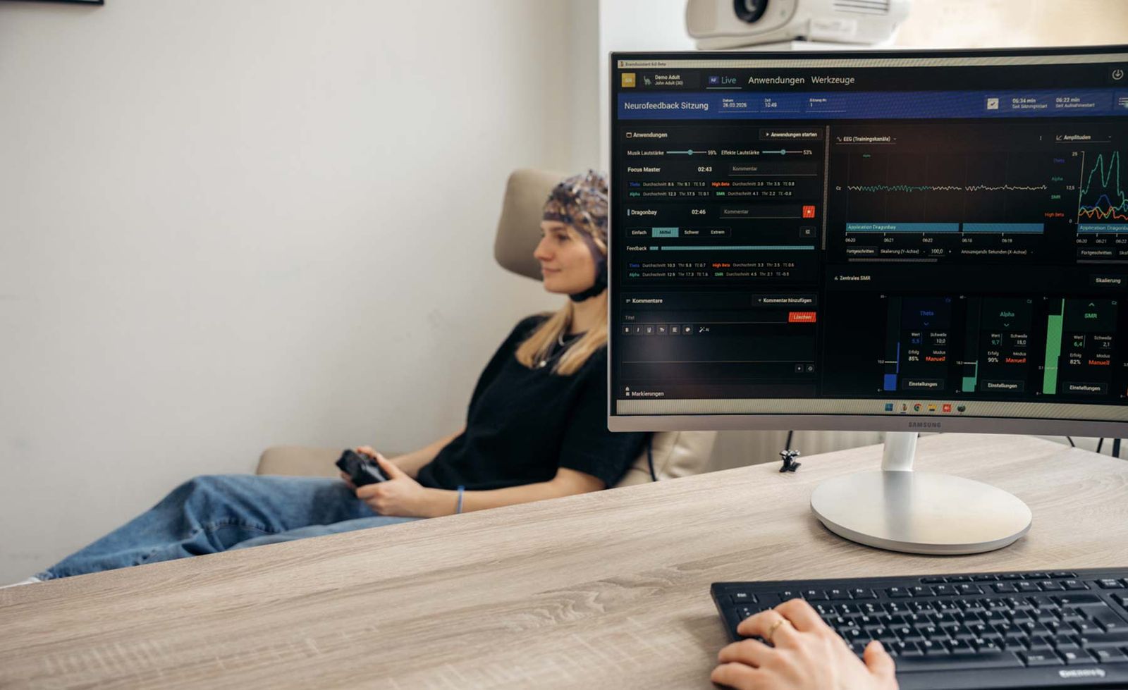 A client wearing the QEEG sensor cap during a brain mapping session